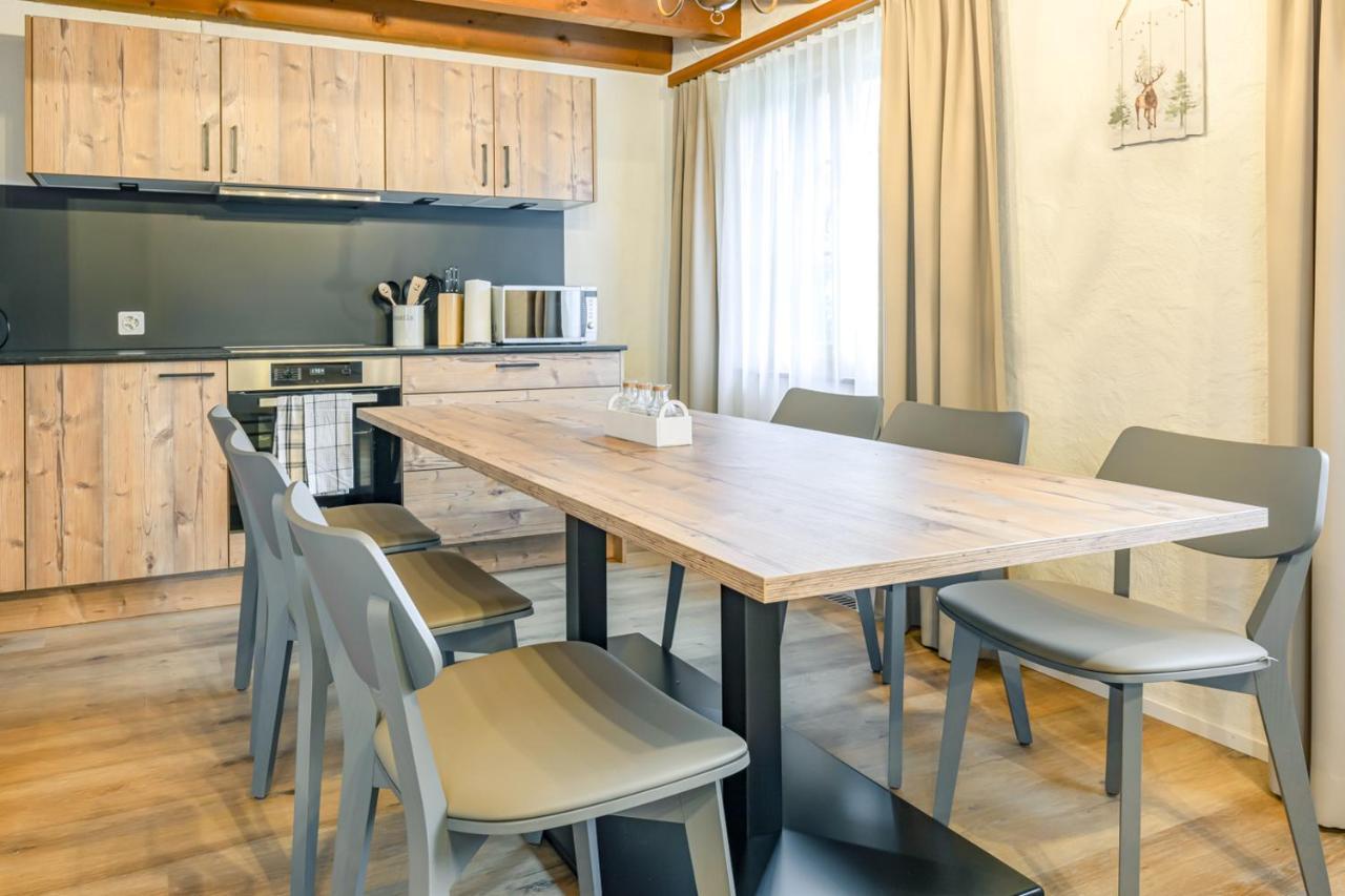Apartment Eiger - Aare Jungfrau Ag Grindelwald Eksteriør billede